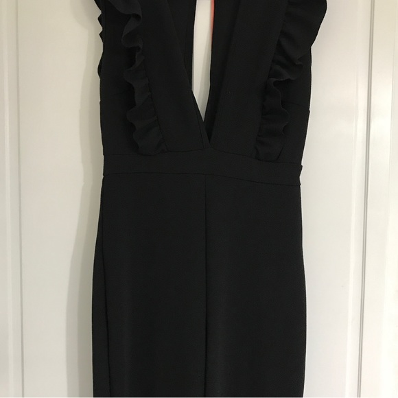 Ruffle Plunge One-Piece Jumpsuit - Picture 8 of 10